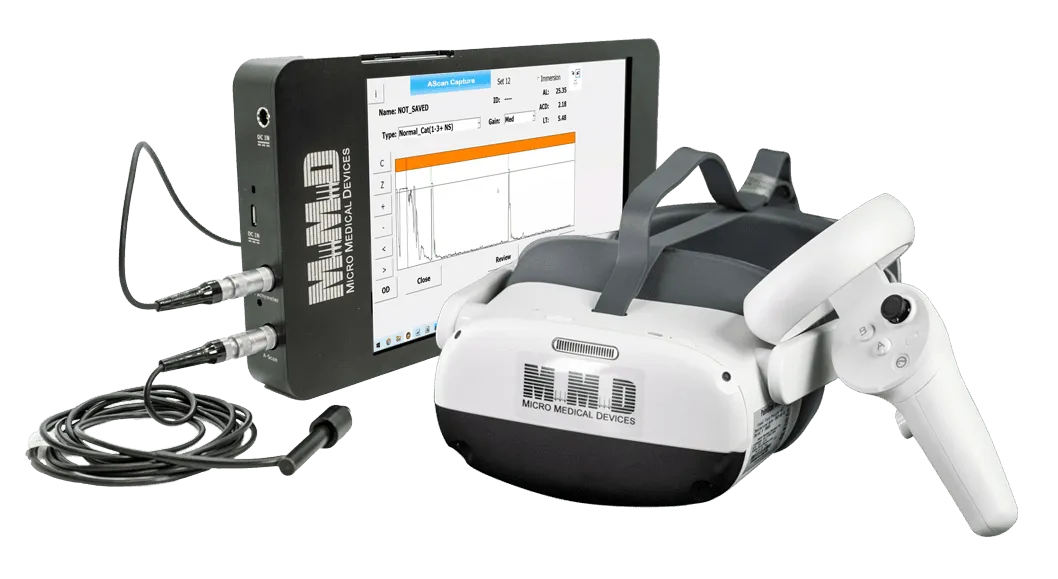 A diagnostic device including a touchscreen monitor displaying a medical graph, two connected cables, a VR headset labeled Micro Medical Devices, and a handheld controller.